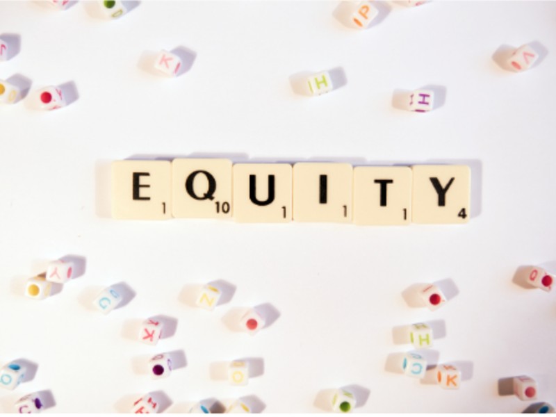 The word equity in Scrabble letters